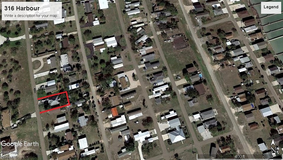 aerial view of property, outlined in red
