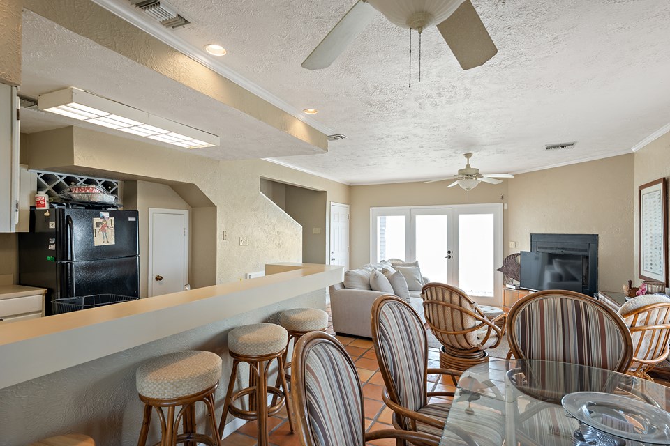 the opening just past the counter is the stairway to the upstairs bedrooms