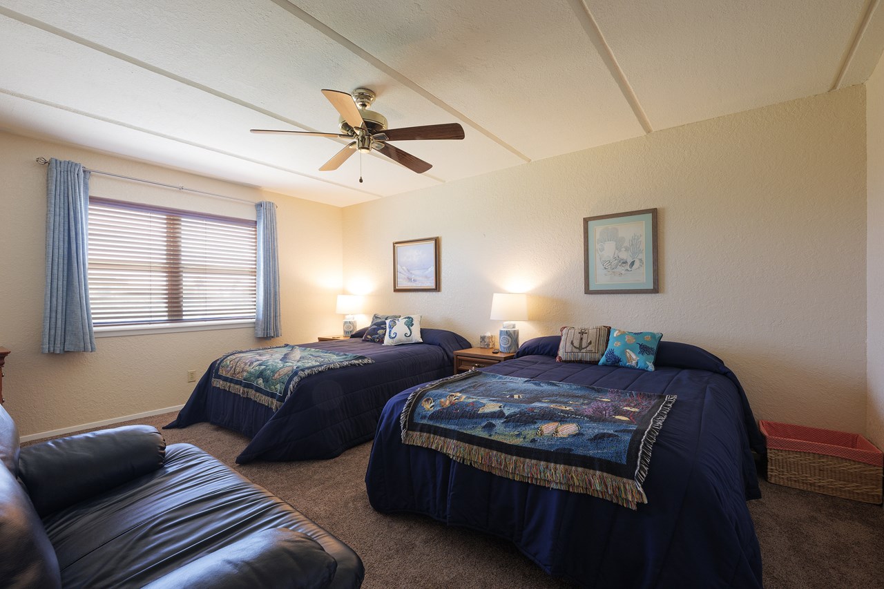 second bedroom is across the hall from the master bedroom not shown in the pictures, the washer and dryer are located in the hallway