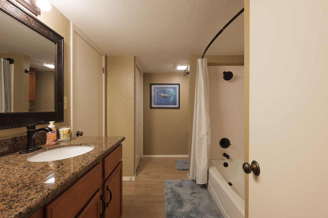 second bath with tub/shower the doorway on your left leads to the second bedroom and there is also a door in the hallway for access to this guest bathroom