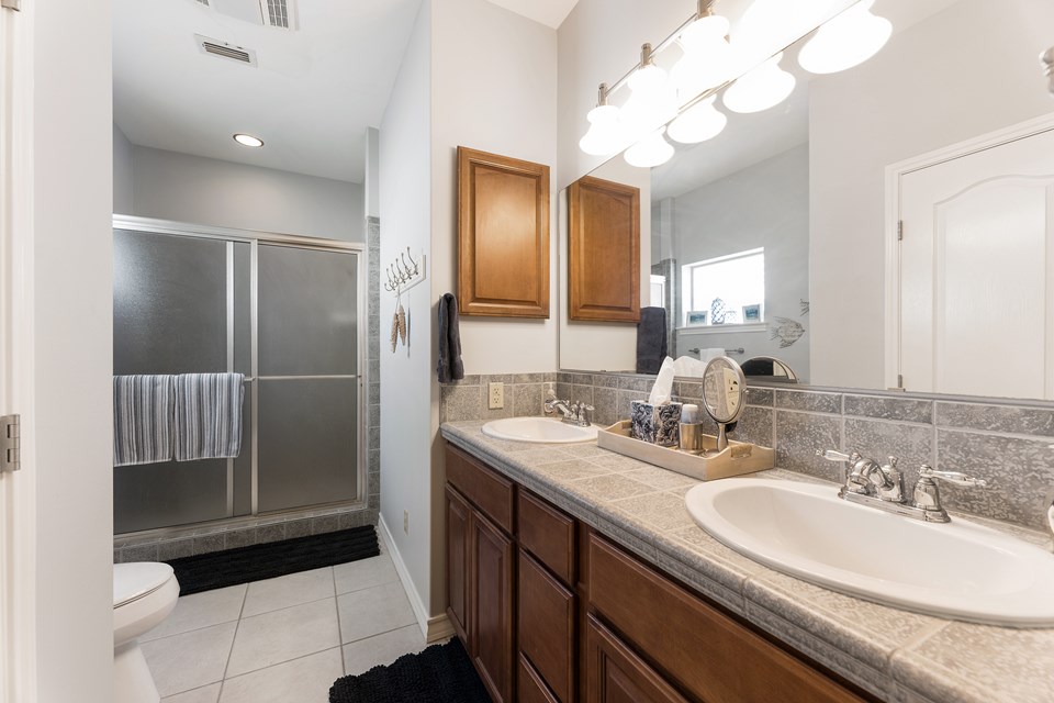 master bath with tub surround shower