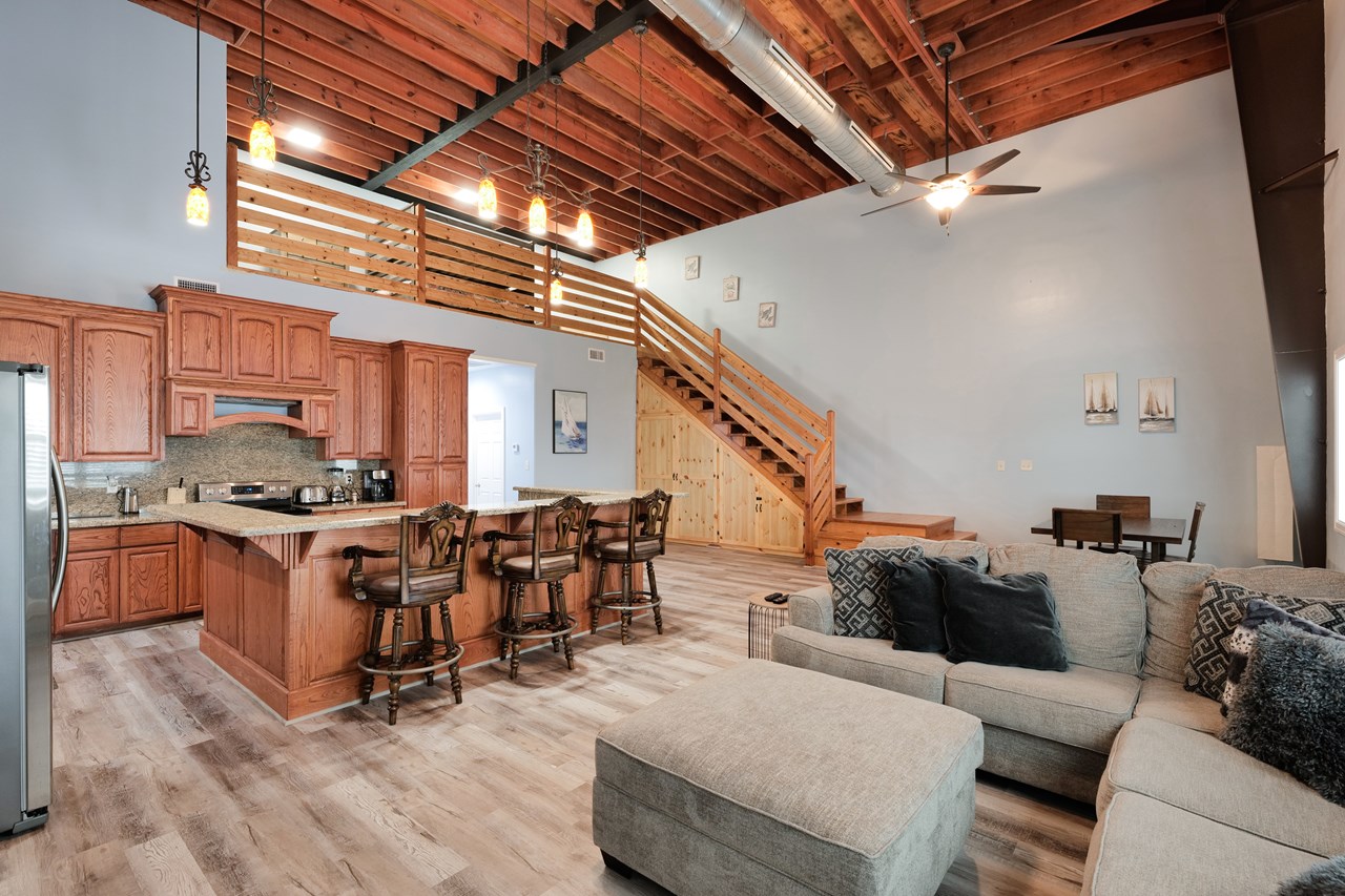this is the left side of the duplex underneath the stairway in the background of this picture is located the full size washer and dryer for this unit. there is a utility room located in the back of the garage which has a washer and dryer for the unit on the right