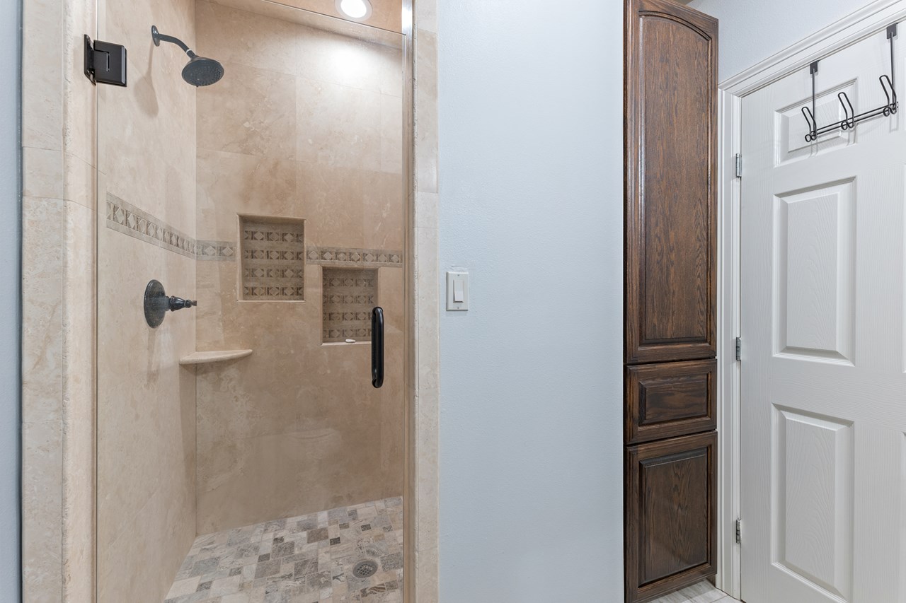 master bedroom custom tile shower all five of the bath's in this complex have tile showers like this one.