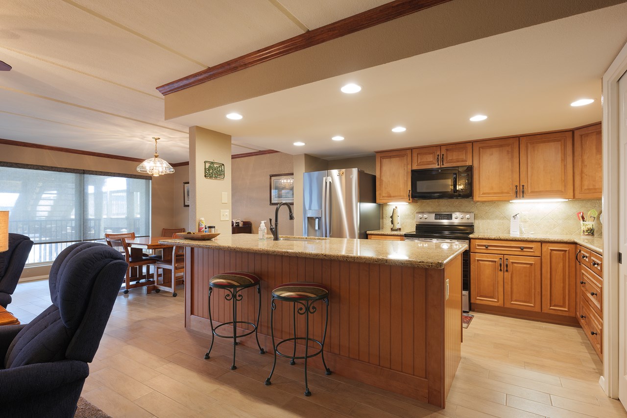 updated kitchen including new cabinets, granite countertops, etc.