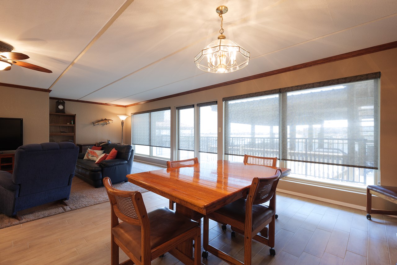 the shades on these waterfront windows can be raised and lowered easily