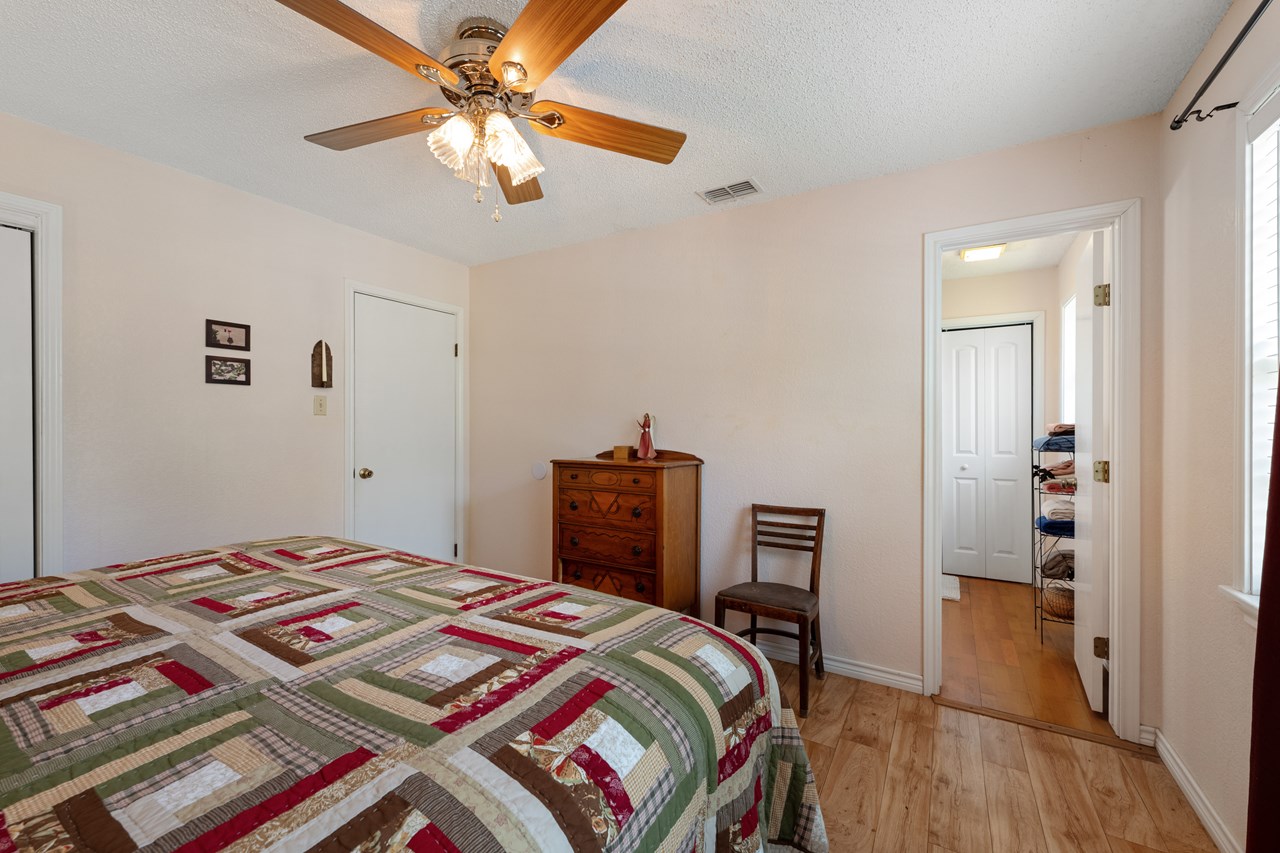 master bedroom with master bath in the background