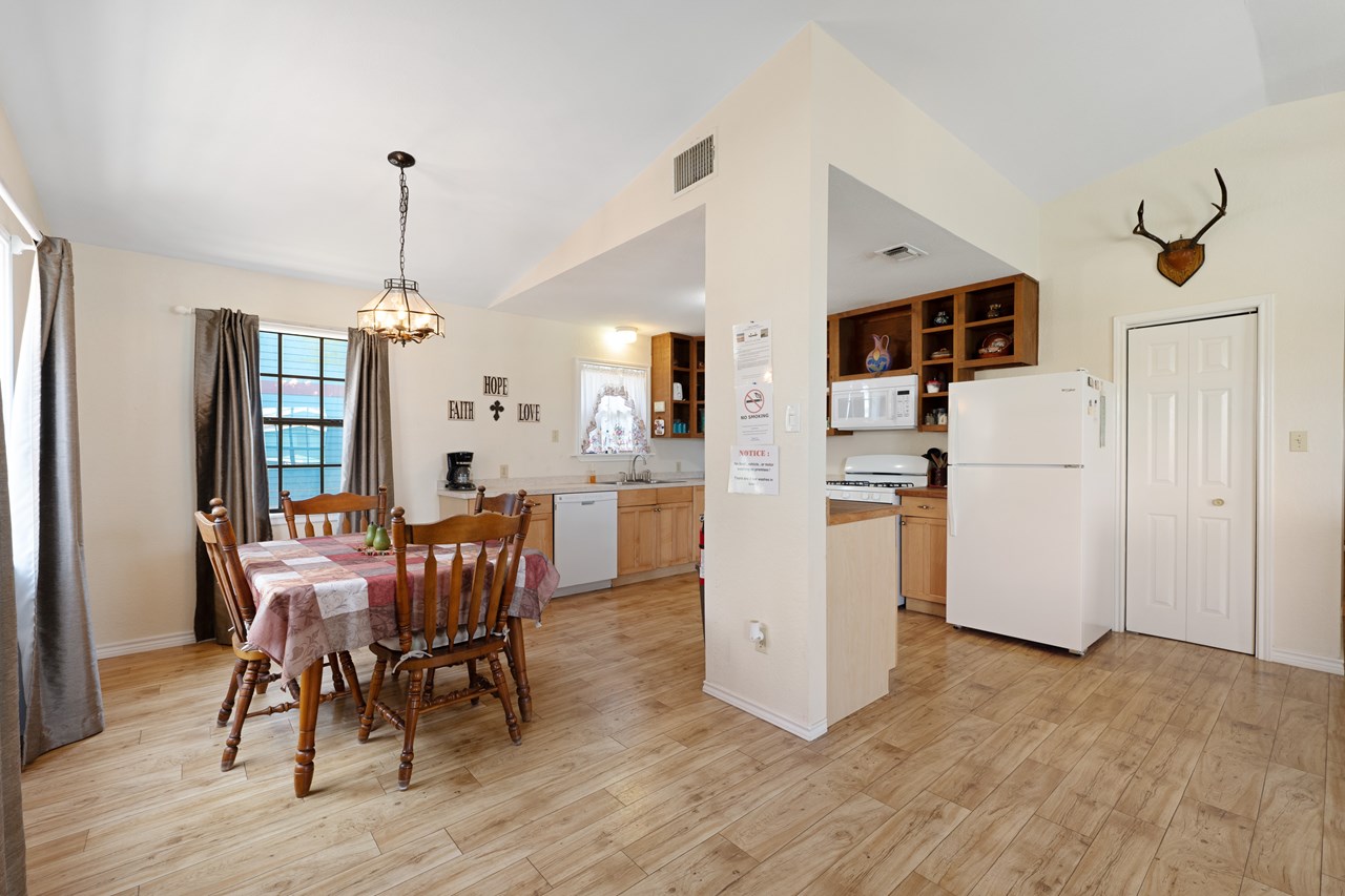there is a propane stove in the kitchen all the flooring in this home is laminate. there is no carpeting