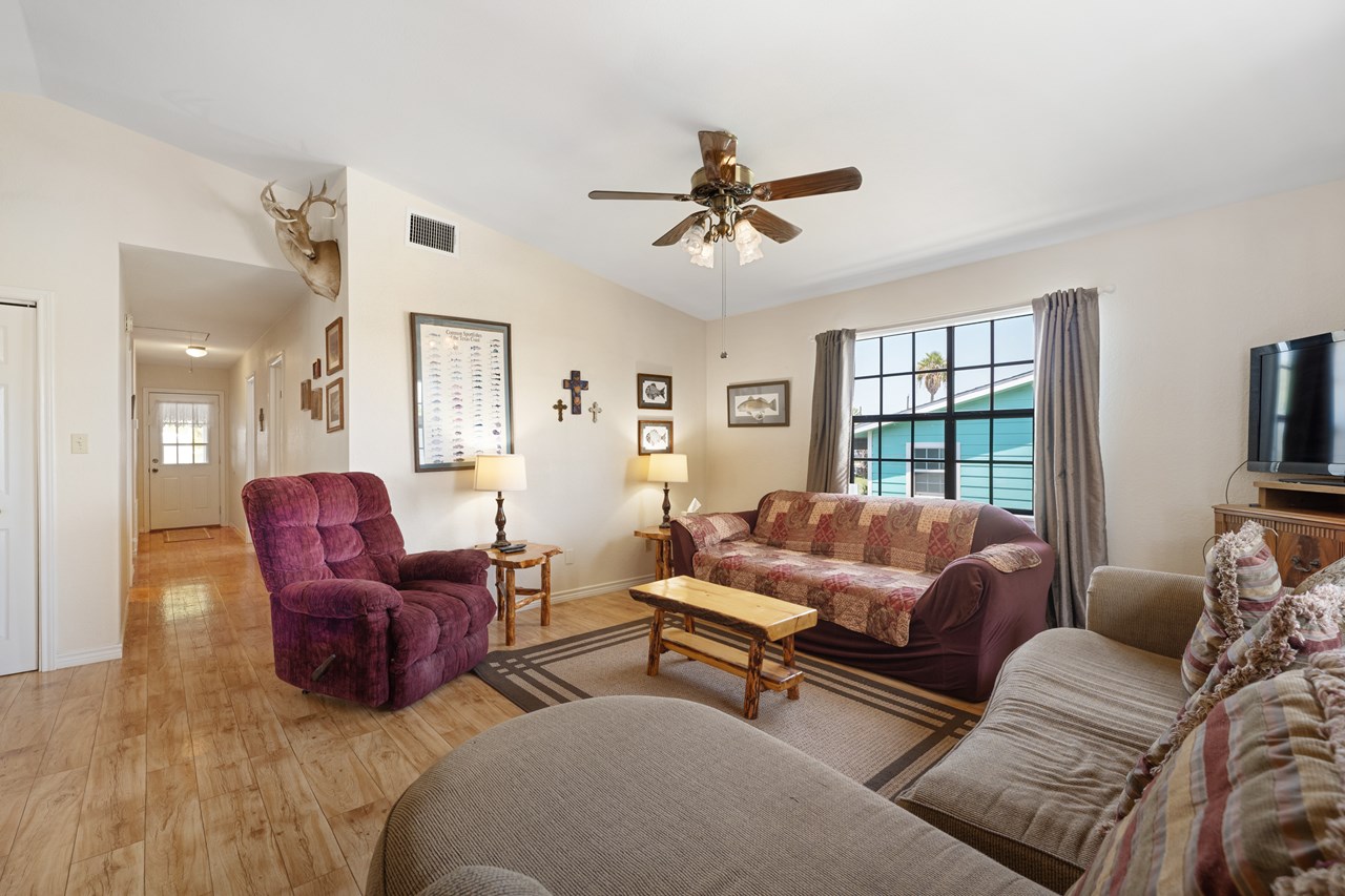 the doorway in the background to your left leads to the other bedrooms and deck