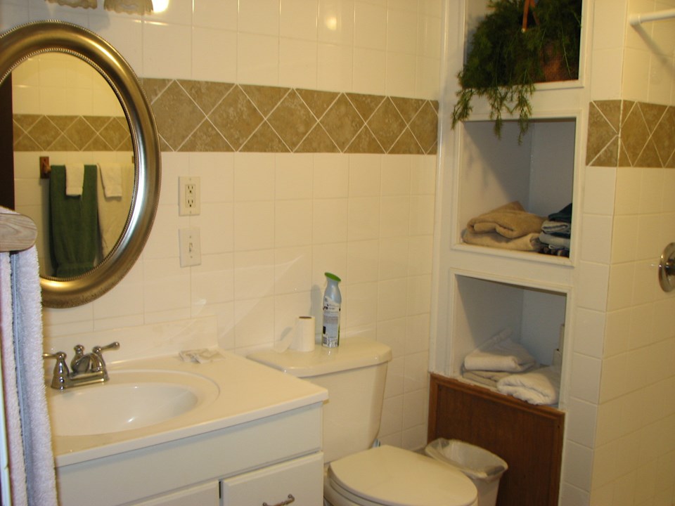 lovely full bath with large custom tile shower