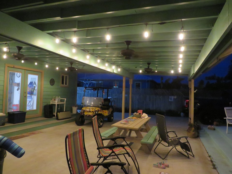 evening view of the lighted patio
