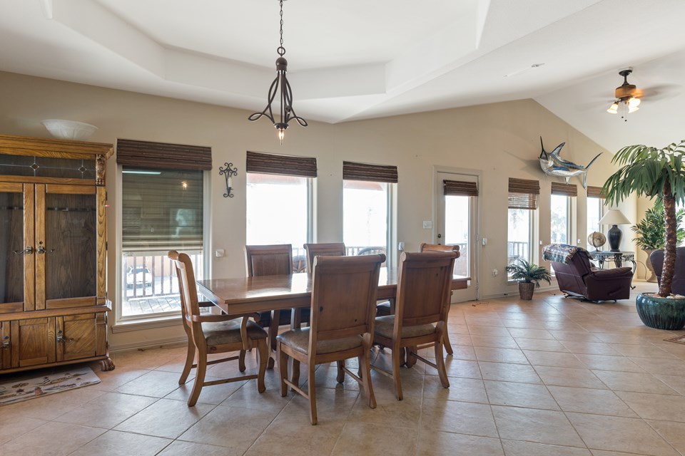 the view from the upstairs living area is just spectacular! all of the windows and doors on this home have windstorm shutters.  these shutters are going to require some maintenance.